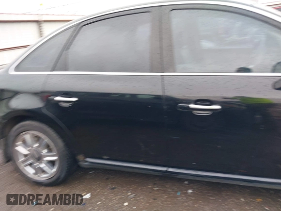 2008 Mercury Sable Premier z VIN 1MEHM42W38G611612, wystawiony jako IAAI lot #41965495 z przebiegiem 190 996 mil mil oraz . Historia ofert i sprzedaży dostępna na DreamBid. Obrazek 13.