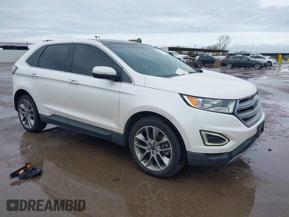 2015 Ford Edge Titanium z VIN 2FMTK3K82FBC42299, wystawiony jako IAAI lot #41912657 z przebiegiem 198 144 mil mil oraz . Historia ofert i sprzedaży dostępna na DreamBid. Obrazek 1.
