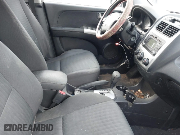 2009 Kia Sportage LX with VIN KNDJF723X97613377, listed as a IAAI auction lot 41454472 with 167,790 mi miles. Bid and sale history available at carsss.com. Image 5.
