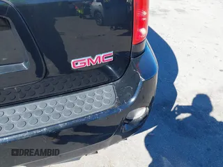 2008 GMC Envoy Denali with VIN 1GKET63M082175769, listed as a IAAI auction lot 41604135 with 136,013 mi miles. Bid and sale history available at carsss.com. Image 6.