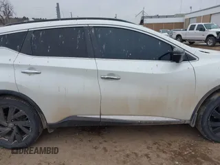 2017 Nissan Murano S with VIN 5N1AZ2MH0HN185795, listed as a IAAI auction lot 41557000 with 182,687 mi miles and . Bid and sale history available at DreamBid. Image 13.