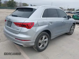 2021 Audi Q3 Premium with VIN WA1AUCF35M1066713, listed as a IAAI auction lot 41395334 with 82,724 mi miles and . Bid and sale history available at DreamBid. Image 4.