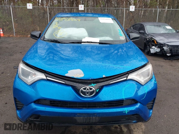 2016 Toyota RAV4 LE with VIN JTMBFREV9GJ100635, listed as a IAAI auction lot 41858669 with 171,644 mi miles. Bid and sale history available at carsss.com. Image 12.