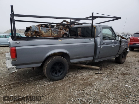 1987 Ford F-150 with VIN 1FTDF15Y6HPA66012, listed as a Copart auction lot 85805244 with 32,344 mi miles and Salvage Title. Bid and sale history available at carsss.com. Image 3.