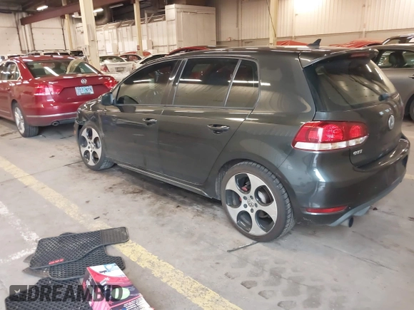 2012 Volkswagen GTI w/Sunroof & Navi PZEV with VIN WVWGD7AJ2CW100248, listed as a IAAI auction lot 41905190 with 106,489 mi miles and . Bid and sale history available at DreamBid. Image 3.