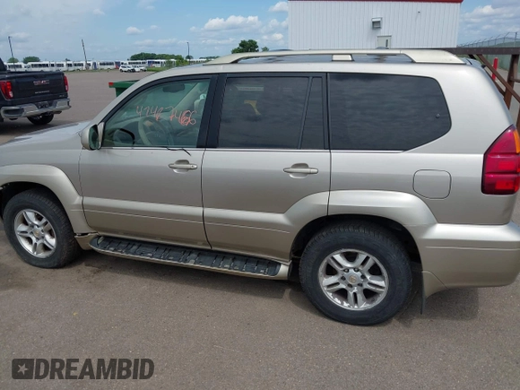 2003 Lexus GX 470 z VIN JTJBT20X930014196, wystawiony jako IAAI lot #42467486 z przebiegiem 282 962 mil mil oraz . Historia ofert i sprzedaży dostępna na DreamBid. Obrazek 14.
