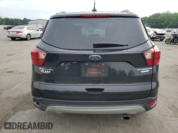 2019 Ford Escape Titanium with VIN 1FMCU0J95KUB14713, listed as a Copart auction lot 55887895 with 85,414 mi miles and Salvage title. Bid and sale history available at DreamBid. Image 6.
