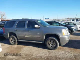 2012 GMC Yukon SLE with VIN 1GKS1AE06CR218372, listed as a IAAI auction lot 41591288 with 166,596 mi miles. Bid and sale history available at carsss.com. Image 13.