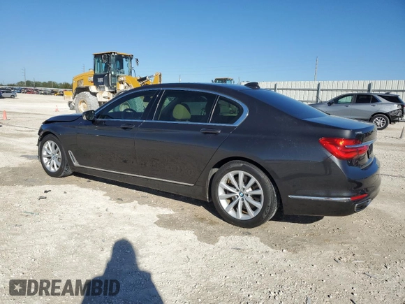 2018 BMW 7 Series 740i with VIN WBA7E2C55JG742497, listed as a Copart auction lot 82173994 with 52,354 mi miles and Salvage Title. Bid and sale history available at carsss.com. Image 2.