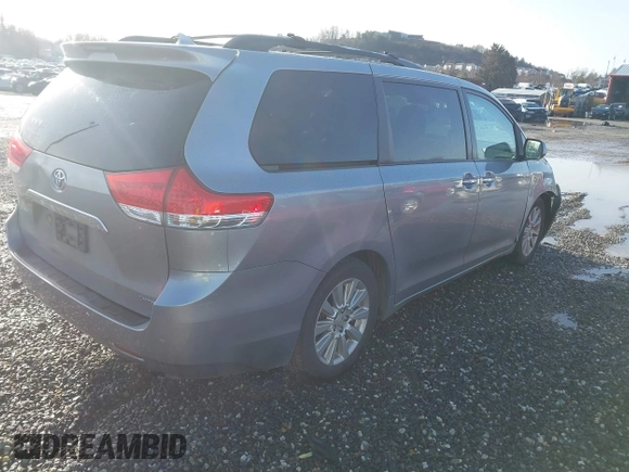 2011 Toyota Sienna XLE AAS with VIN 5TDYK3DC2BS025842, listed as a IAAI auction lot 41721185 with 228,959 mi miles and . Bid and sale history available at DreamBid. Image 4.