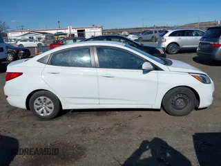 2015 Hyundai Accent GLS with VIN KMHCT4AEXFU905526, listed as a IAAI auction lot 41740175 with 104,023 mi miles and . Bid and sale history available at carsss.com. Image 13.