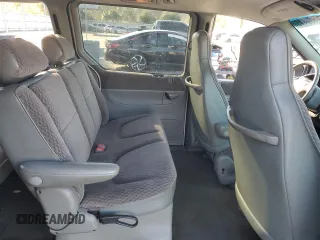 1999 Plymouth Voyager Grand SE z VIN 2P4GP44G3XR431744, wystawiony jako Copart lot #87659415 z przebiegiem Nie podano mil oraz Szkody całkowita. Historia ofert i sprzedaży dostępna na DreamBid. Obrazek 11.
