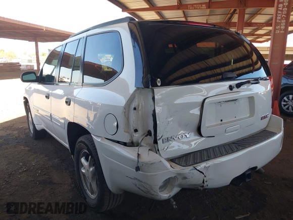 2004 GMC Envoy SLT with VIN 1GKDS13S442217242, listed as a IAAI auction lot 42573887 with 210,296 mi miles and . Bid and sale history available at DreamBid. Image 3.