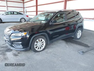 2019 Jeep Cherokee Latitude z VIN 1C4PJLCB1KD444428, wystawiony jako IAAI lot #42157384 z przebiegiem 58 948 mil mil oraz . Historia ofert i sprzedaży dostępna na DreamBid. Obrazek 2.