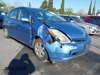2005 Toyota Prius z VIN JTDKB20U157048381, wystawiony jako IAAI lot #41764378 z przebiegiem 248 659 mil mil oraz . Historia ofert i sprzedaży dostępna na DreamBid. Obrazek 1.