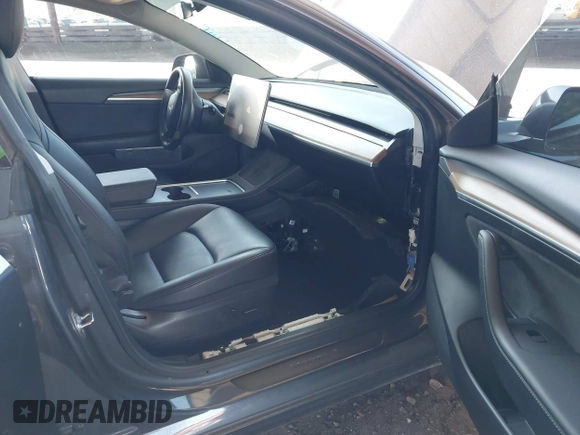 2022 Tesla Model 3 Long Range z VIN 5YJ3E1EB5NF205806, wystawiony jako IAAI lot #42063489 z przebiegiem 63 307 mil mil oraz . Historia ofert i sprzedaży dostępna na DreamBid. Obrazek 5.