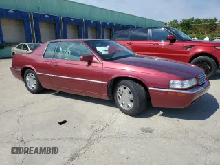 1997 Cadillac Eldorado ESC z VIN 1G6EL12Y5VU614955, wystawiony jako Copart lot #56222345 z przebiegiem 62 030 mil mil oraz Tytuł czysty. Historia ofert i sprzedaży dostępna na DreamBid. Obrazek 4.