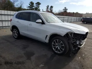 2020 BMW X5 xDrive40i with VIN 5UXCR6C04L9B36134, listed as a Copart auction lot 52220665 with 51,285 mi miles and Salvage title. Bid and sale history available at DreamBid. Image 4.