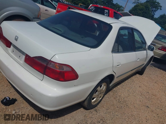 1999 Honda Accord LX z VIN JHMCG5640XC051473, wystawiony jako IAAI lot #42455960 z przebiegiem 200 284 mil mil oraz . Historia ofert i sprzedaży dostępna na DreamBid. Obrazek 4.