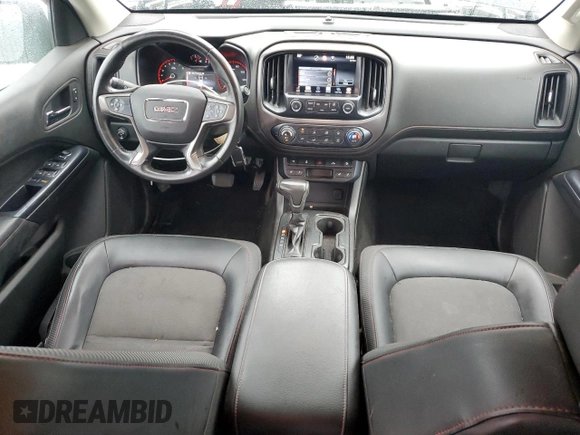 2015 GMC Canyon 4WD SLE with VIN 1GTG6BE37F1157166, listed as a Copart auction lot 71279914 with 114,484 mi miles and Salvage Title. Bid and sale history available at carsss.com. Image 8.