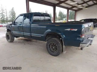 1999 Ford Super Duty F-350 SRW XL with VIN 1FTSX31F3XEA41504, listed as a IAAI auction lot 41916567 with 291,742 mi miles. Bid and sale history available at carsss.com. Image 3.