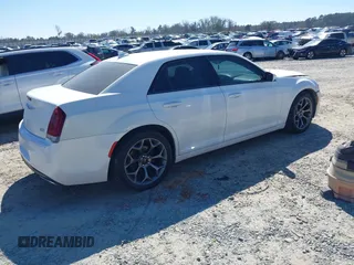 2015 Chrysler 300 with VIN 2C3CCABG9FH736013, listed as a IAAI auction lot 41646979 with 103,572 mi miles. Bid and sale history available at carsss.com. Image 4.