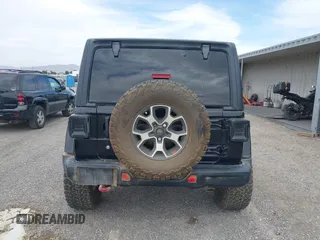 2022 Jeep Wrangler Unlimited Rubicon with VIN 1C4HJXFN2NW134024, listed as a IAAI auction lot 42248188 with 41,899 mi miles and . Bid and sale history available at DreamBid. Image 16.