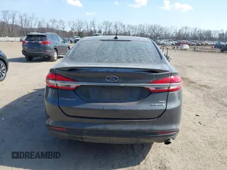 2018 Ford Fusion SE z VIN 3FA6P0LU6JR118226, wystawiony jako IAAI lot #41811406 z przebiegiem 165 352 mil mil oraz . Historia ofert i sprzedaży dostępna na DreamBid. Obrazek 17.