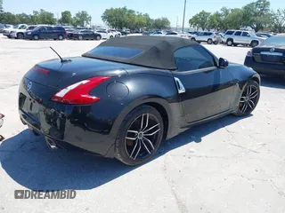 2017 Nissan 370Z Touring with VIN JN1AZ4FHXHM940571, listed as a IAAI auction lot 42062855 with 1 mi miles. Bid and sale history available at carsss.com. Image 4.