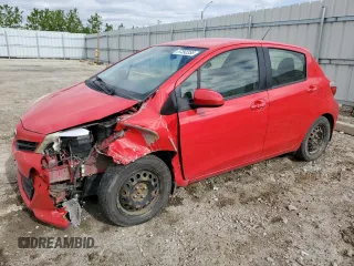 2012 Toyota Yaris L with VIN JTDKTUD32CD517695, listed as a Copart auction lot 57392355 with 201,711 mi miles and Salvage title. Bid and sale history available at DreamBid. Image 1.