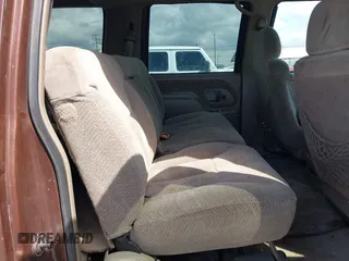 1999 Chevrolet Suburban with VIN 1GNGK26J9XJ494147, listed as a IAAI auction lot 41945149 with 102,652 mi miles. Bid and sale history available at carsss.com. Image 8.