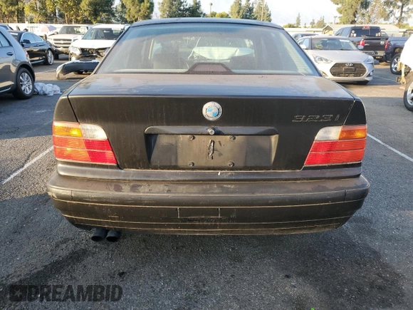 1997 BMW 3 Series 328iA with VIN WBACD4325VAV48712, listed as a Copart auction lot 80376064 with 158,118 mi miles and Salvage Title. Bid and sale history available at carsss.com. Image 6.