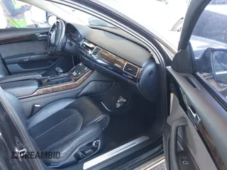 2011 Audi A8 with VIN WAURVAFD1BN027915, listed as a IAAI auction lot 41635275 with 95,143 mi miles and . Bid and sale history available at DreamBid. Image 5.