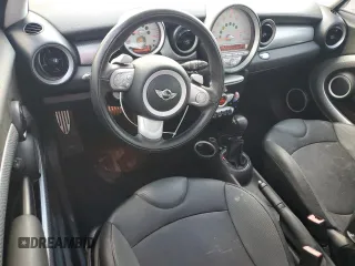 2009 MINI Hardtop S with VIN WMWMF73569TW87834, listed as a Copart auction lot 60362395 with 52,448 mi miles and Salvage title. Bid and sale history available at DreamBid. Image 8.