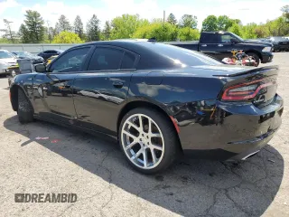 2017 Dodge Charger R/T with VIN 2C3CDXCT2HH571999, listed as a Copart auction lot 55642235 with 102,719 mi miles and Salvage title. Bid and sale history available at DreamBid. Image 2.