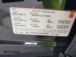 2017 Tesla Model X 90D with VIN 5YJXCAE2XHF075341, listed as a IAAI auction lot 41784008 with 77,439 mi miles and . Bid and sale history available at DreamBid. Image 9.