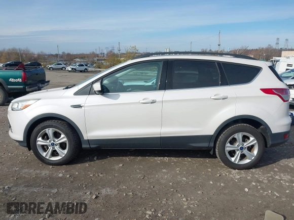 2014 Ford Escape SE with VIN 1FMCU0GX1EUB23743, listed as a IAAI auction lot 40893420 with 74,506 mi miles. Bid and sale history available at carsss.com. Image 13.
