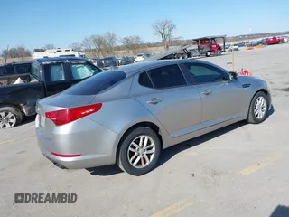 2013 Kia Optima LX with VIN KNAGM4A73D5356339, listed as a IAAI auction lot 41979364 with 140,000 mi miles. Bid and sale history available at carsss.com. Image 4.