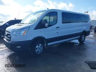 2020 Ford Transit Passenger XL with VIN 1FBAX2Y81LKA26321, listed as a IAAI auction lot 41110834 with Not Provided miles and . Bid and sale history available at DreamBid. Image 2.