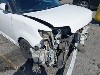 2014 Scion xB with VIN JTLZE4FE5EJ065953, listed as a IAAI auction lot 41850554 with 124,856 mi miles. Bid and sale history available at carsss.com. Image 18.