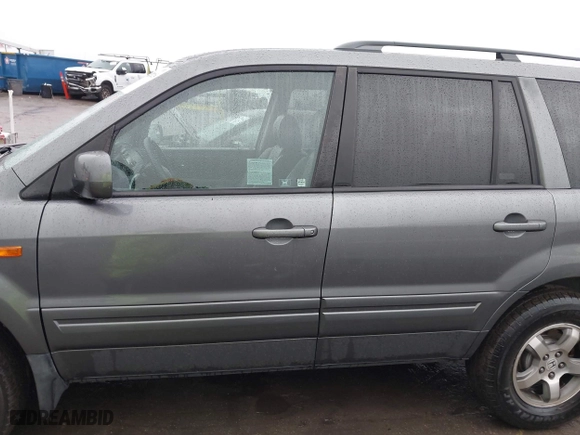 2007 Honda Pilot EX-L with VIN 5FNYF28617B024003, listed as a IAAI auction lot 41479218 with 201,868 mi miles. Bid and sale history available at carsss.com. Image 14.