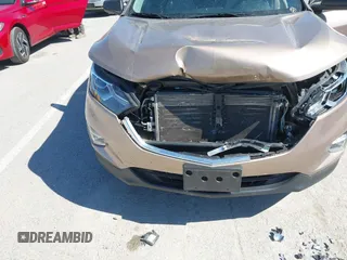 2018 Chevrolet Equinox LS with VIN 2GNAXHEV2J6160948, listed as a IAAI auction lot 41818156 with 152,457 mi miles and . Bid and sale history available at DreamBid. Image 6.