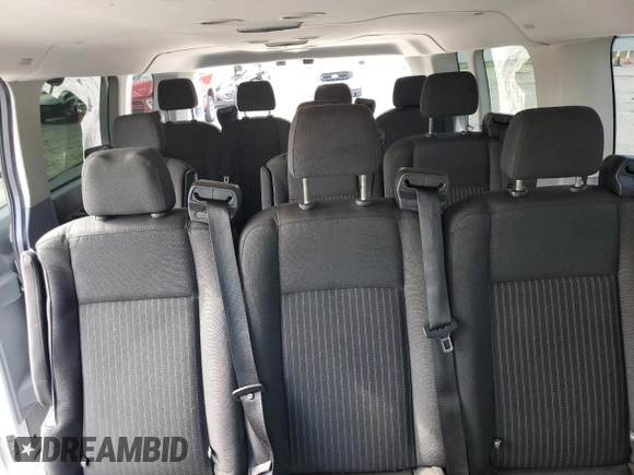 2017 Ford Transit XL z VIN 1FBZX2YM9HKA63396, wystawiony jako Copart lot #58976585 z przebiegiem 123 213 mil mil oraz Szkoda całkowita • Salvage title. Historia ofert i sprzedaży dostępna na DreamBid. Obrazek 10.