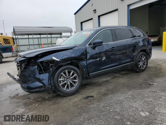 2021 Mazda CX-9 Touring with VIN JM3TCACY5M0517691, listed as a Copart auction lot 48593415 with 82,701 mi miles and Clean Title. Bid and sale history available at carsss.com. Image 1.