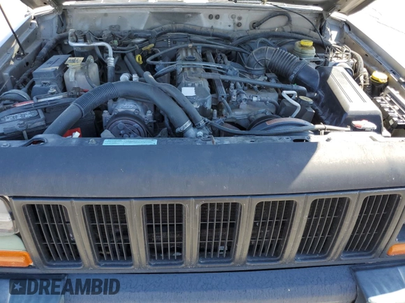 2000 Jeep Cherokee SE with VIN 1J4FF27SXYL140055, listed as a Copart auction lot 70315454 with 176,017 mi miles and Salvage title. Bid and sale history available at DreamBid. Image 12.