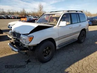 2000 Toyota Land Cruiser with VIN JT3HT05J5Y0105435, listed as a Copart auction lot 89409795 with 255,587 mi miles and Salvage Title. Bid and sale history available at carsss.com. Image 1.