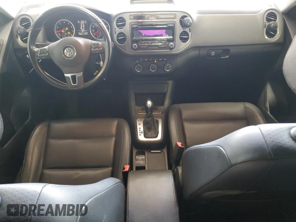 2014 Volkswagen Tiguan SEL with VIN WVGBV3AX2EW541476, listed as a Copart auction lot 64817795 with 158,032 mi miles and Salvage title. Bid and sale history available at DreamBid. Image 8.