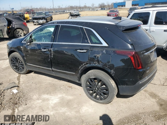 2022 Cadillac XT5 AWD Premium Luxury with VIN 1GYKNDRS7NZ164512, listed as a Copart auction lot 49236945 with 30,019 mi miles and Salvage title. Bid and sale history available at DreamBid. Image 2.