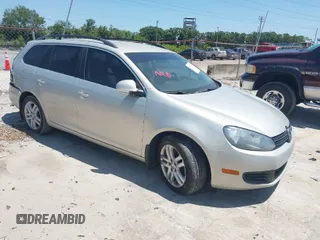 2010 Volkswagen Jetta SportWagen TDI with VIN 3VWPL7AJ5AM687879, listed as a IAAI auction lot 42051137 with 176,398 mi miles. Bid and sale history available at carsss.com. Image 1.