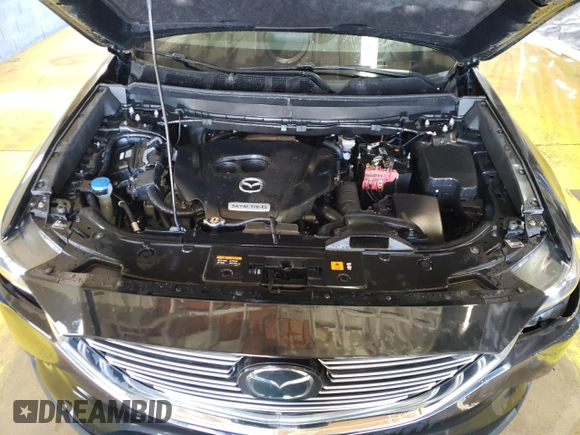2020 Mazda CX-9 Sport z VIN JM3TCBBY5L0414275, wystawiony jako Copart lot #51858385 z przebiegiem 156 985 mil mil oraz Szkoda całkowita • Salvage title. Historia ofert i sprzedaży dostępna na DreamBid. Obrazek 12.